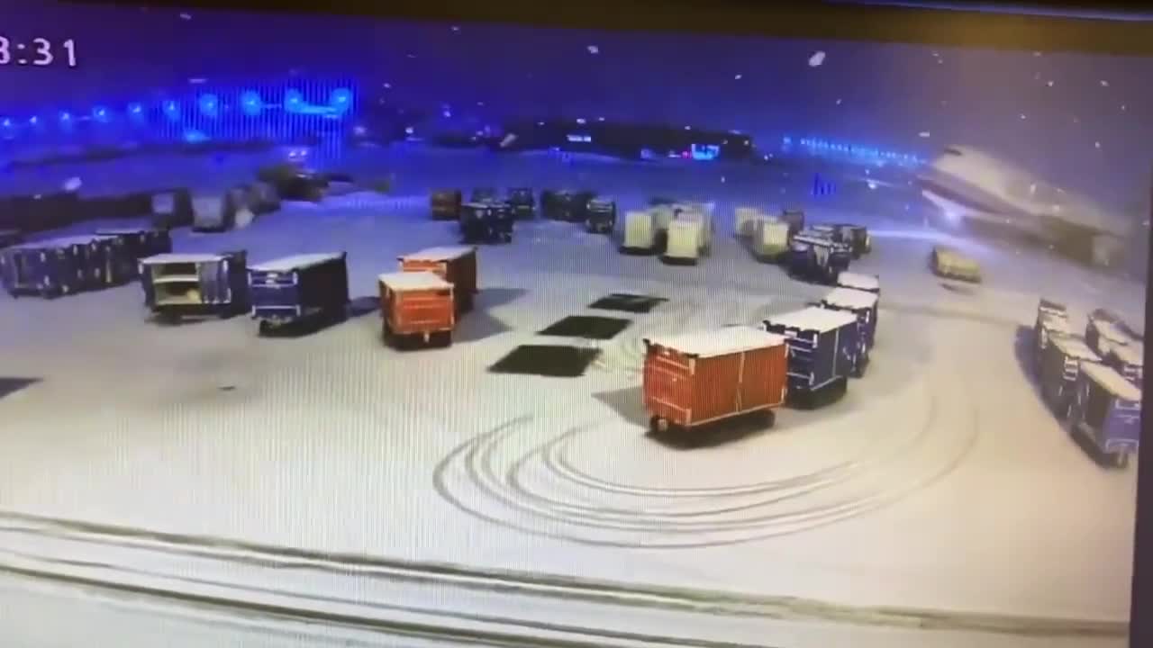 Plane in China Eats Luggage Carts