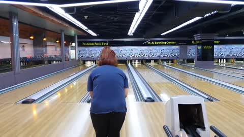 This is bowling. Can she succeed?