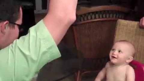 See How dad take care of baby and try not to laugh.