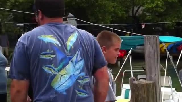 Unbelievable!😱😱 Fish Grabs Man's Arm