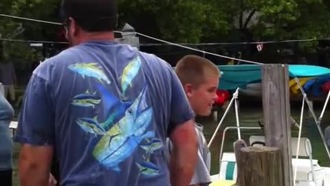 Unbelievable!😱😱 Fish Grabs Man's Arm