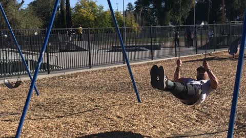 46 year old man flips out of swing