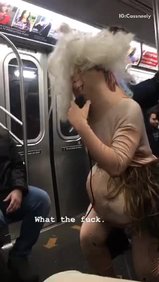 Man with costume on fake grass skin suit yelling