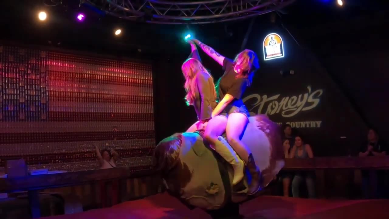 Mechanical bull riding in Las Vegas: Two rodeo queens are united until a slight wardrobe malfunction