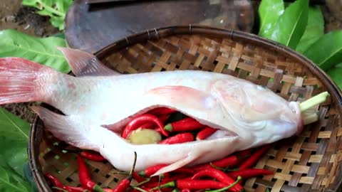 Yummy Red fish tasty with Chili sauce Eating delicious in the jungle