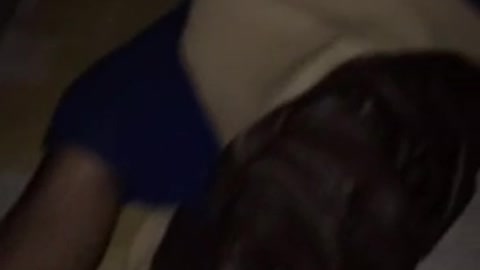Fidget spinner on sleeping man on sidewalk