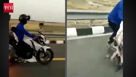 Miraculous escape for couple on a bike