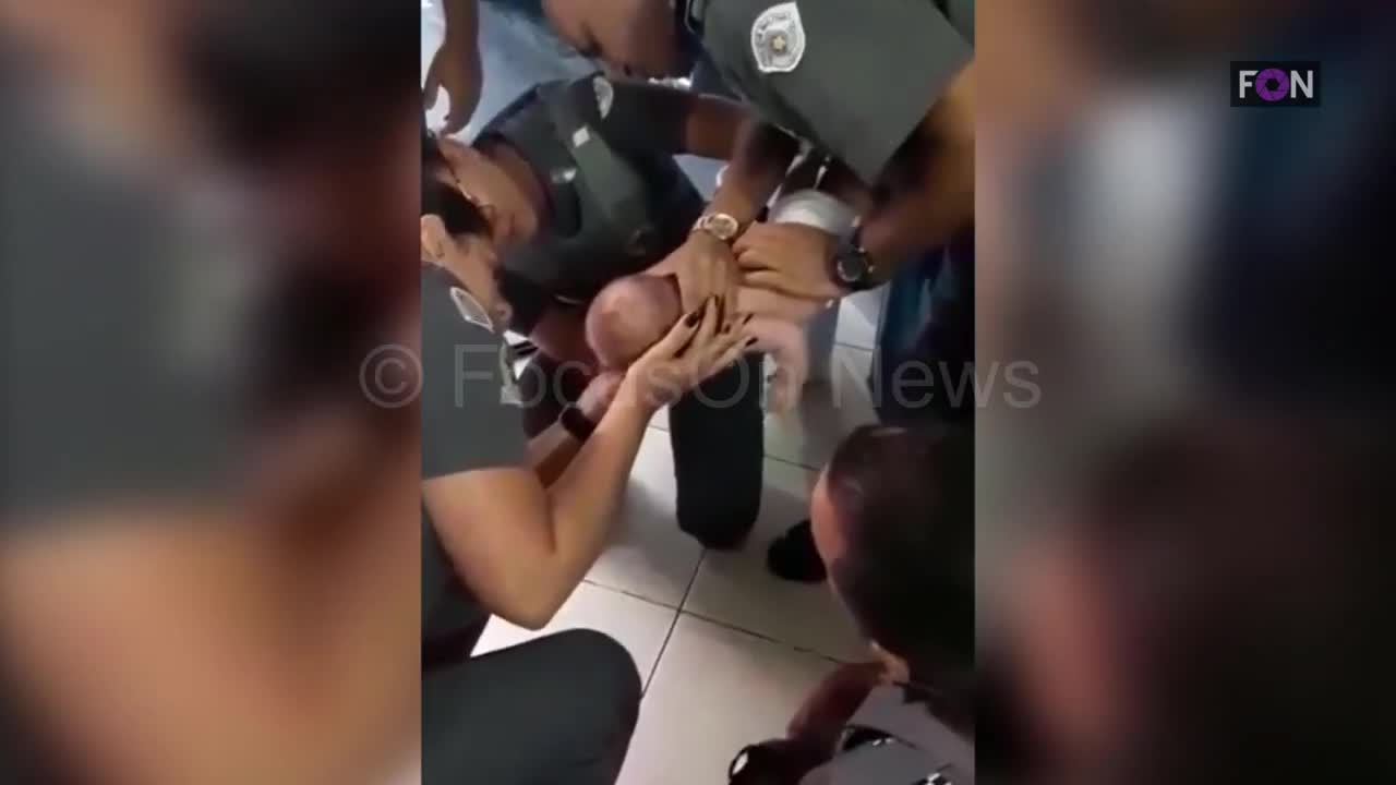 Omg !!! a choking newborn baby saved by police officers