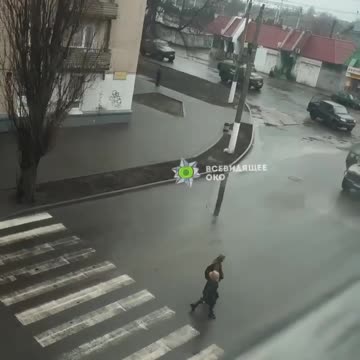 Russian military jeeps cruise through the southern Ukrainian city of Melitopol