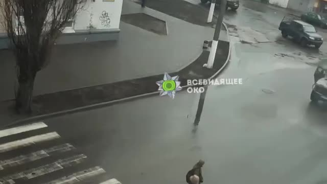 Russian military jeeps cruise through the southern Ukrainian city of Melitopol