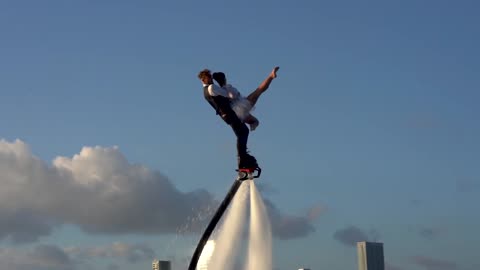 Couple dance with flyboard