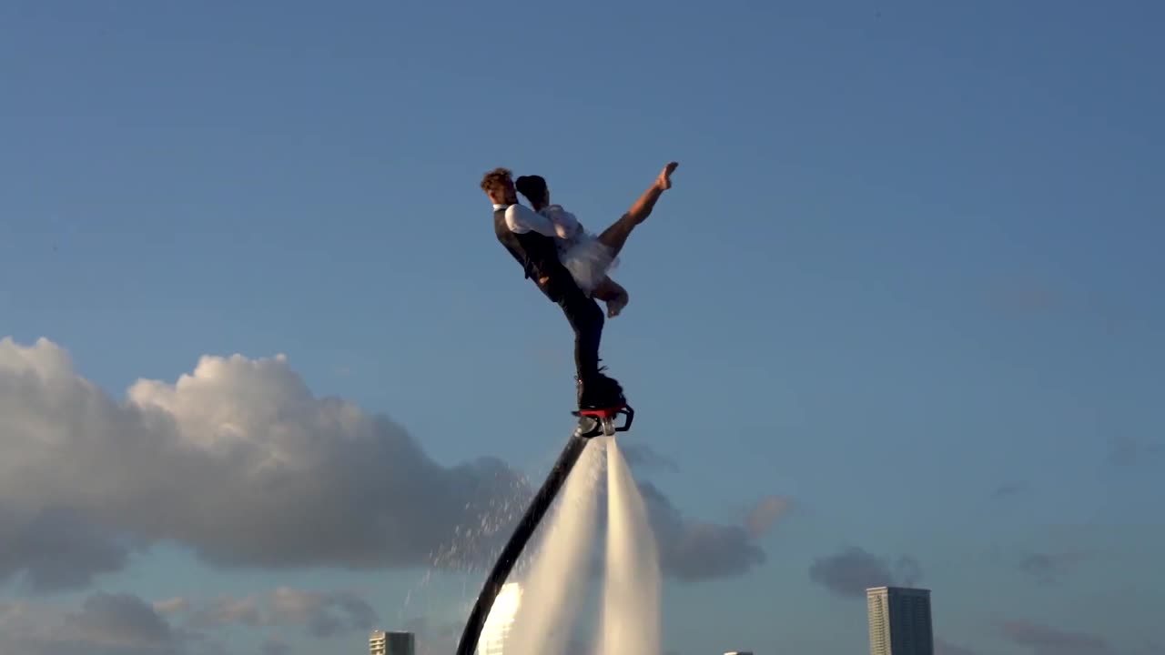 Couple dance with flyboard