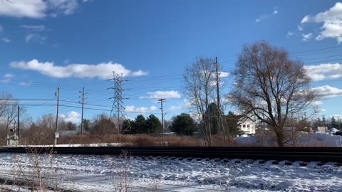 Lightning Fast CSX Train through the snow