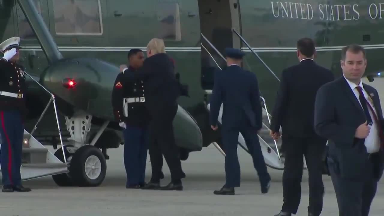 POTUS retrieves marine's hat for him