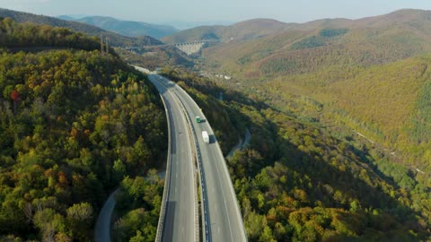 drone footage vehicles traveling on a highway