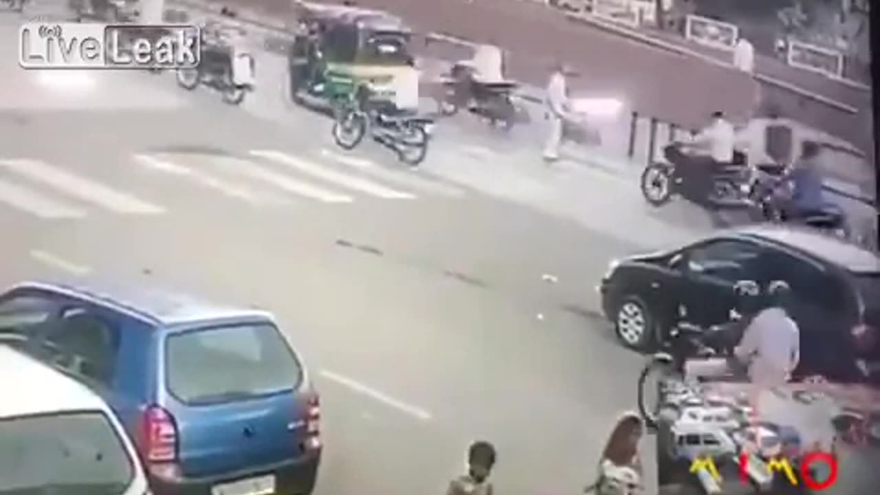 Man in the crosswalk tries to catch the bus, will he make it?