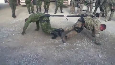 One on one soldier tug of war, Canada vs usa