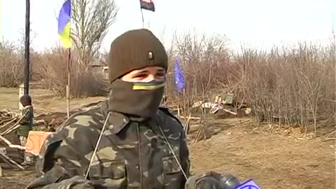 Ukrajinské děti na stanovištích domobrany v blízkosti bojů s ruskou armádou
