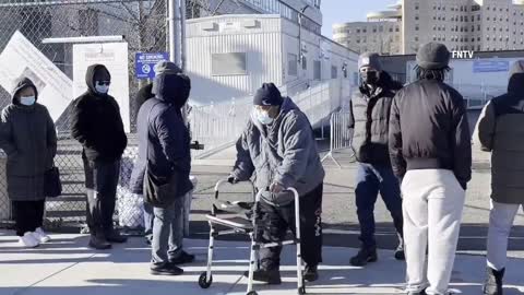 People lined up outside Queens Hospital Center to get a home covid test just to see if they are sick