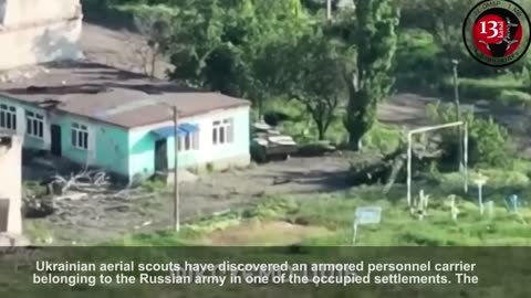 Kamikaze drone targets armored personnel carrier hidden by Russians in residential area