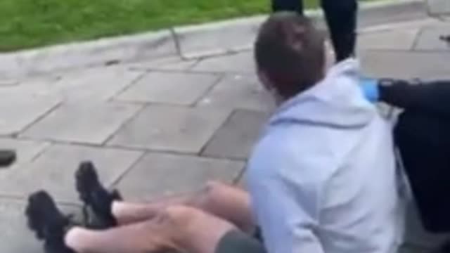 Australian Man Handcuffed for the Crime of Eating Maskless Outside