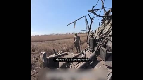 Russians inspect a destroyed T90