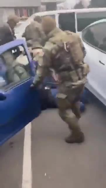Reports suggest this is Ukrainian troops against civilians that they accuse of