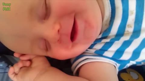 Baby Smiling While Sleeping