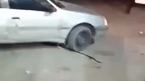 Armed Rebels Fighting the Iranian National Guard on the Streets of Baluchistan in Southeastern Iran.