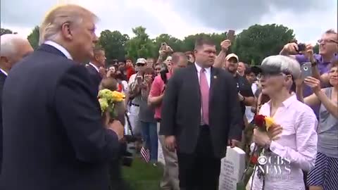 President Trump goes to the gravesite of a fallen solider