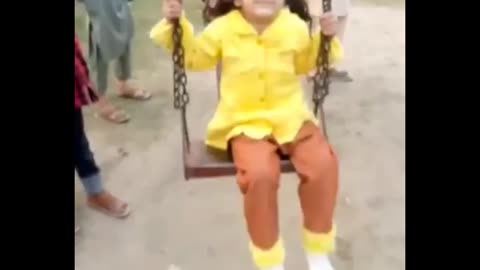 My sweet daughter swinging