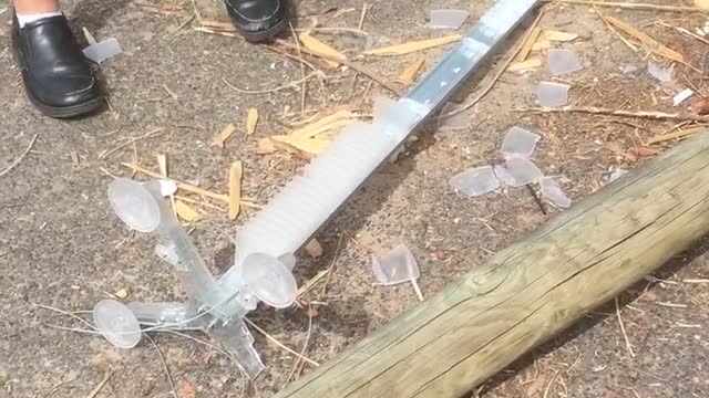 Shorts kid knocks ice of metal pole with casio keyboard
