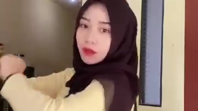 Hijab girl dancing in the room