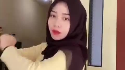 Hijab girl dancing in the room