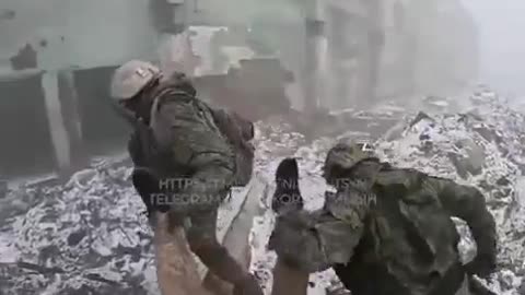 Russian soldiers rescue injured Ukrainian soldier