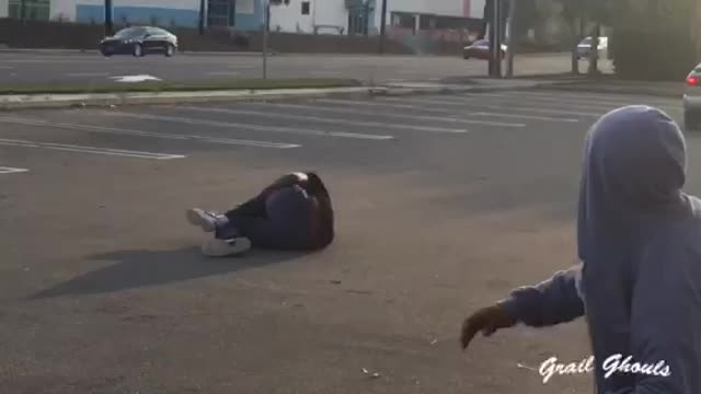 Skateboarder Hangs On Moving Car But Fails And Scrapes The Ground Hard