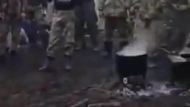 Chechen Fighters in a Russian Military camp singing while on the Border with Ukraine.