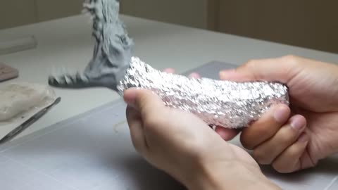 Use polymer clay to make dragon slayer