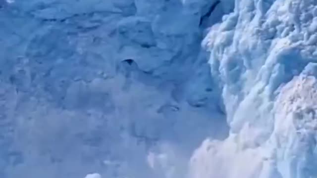 Moment of snow mountain collapse