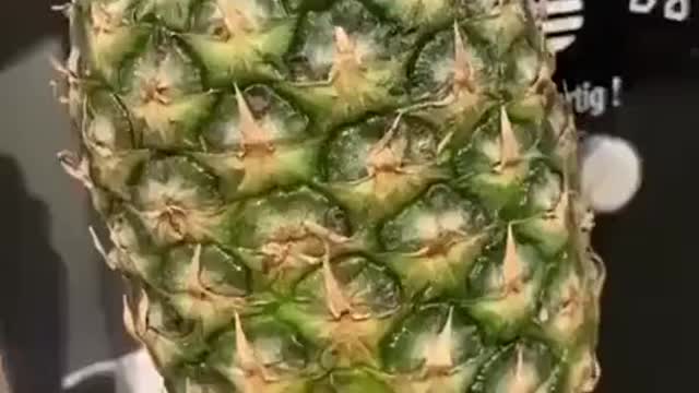 Pineapple slice and dice machine in German supermarket