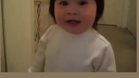 Baby girl try to speak FROG