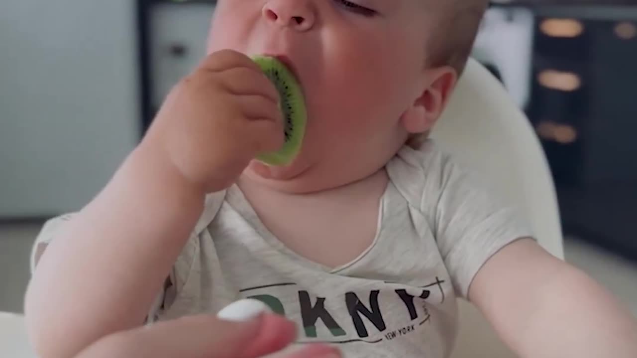 Funny baby reaction