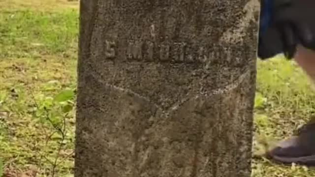 Cleaning a Veteran's Headstone