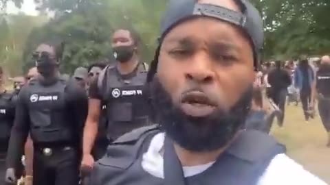 Militant Government Assets March Against Whites. In the UK, this is government allowed terror