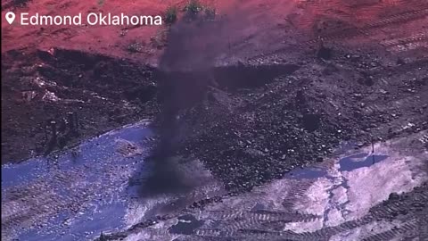 Hazmat crews are on the scene after oil is shooting from the ground