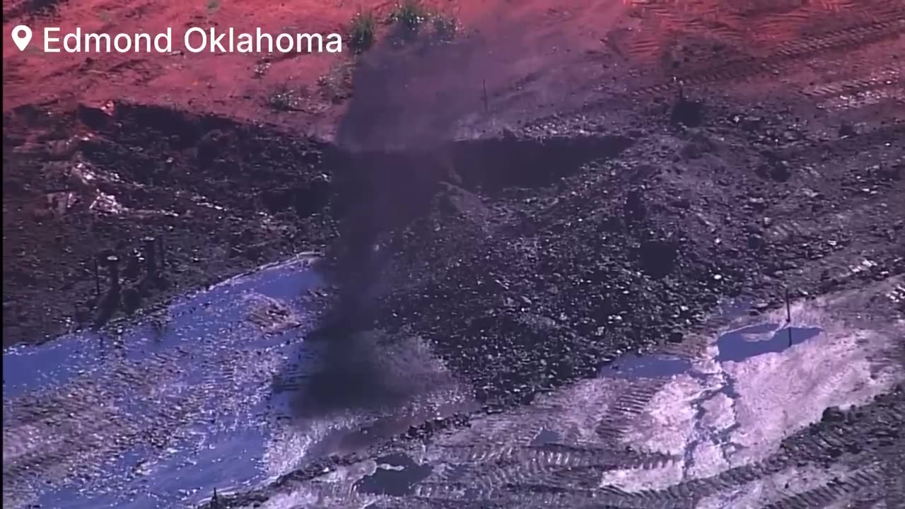 Hazmat crews are on the scene after oil is shooting from the ground