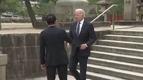 Biden, 80, stumbles while walking down steps of shrine as G7