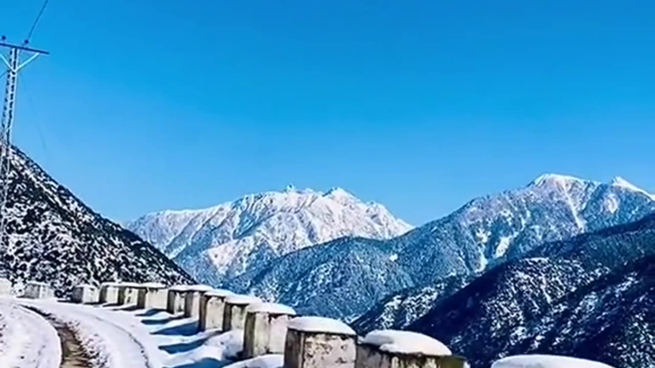 The Mountains of Kashmir and Snowfall View