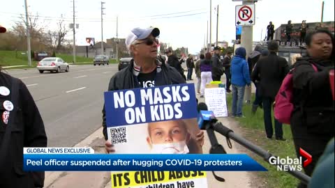 Officer in Ontario suspended after hugging COVID-19 protesters- NEWS OF WORLD