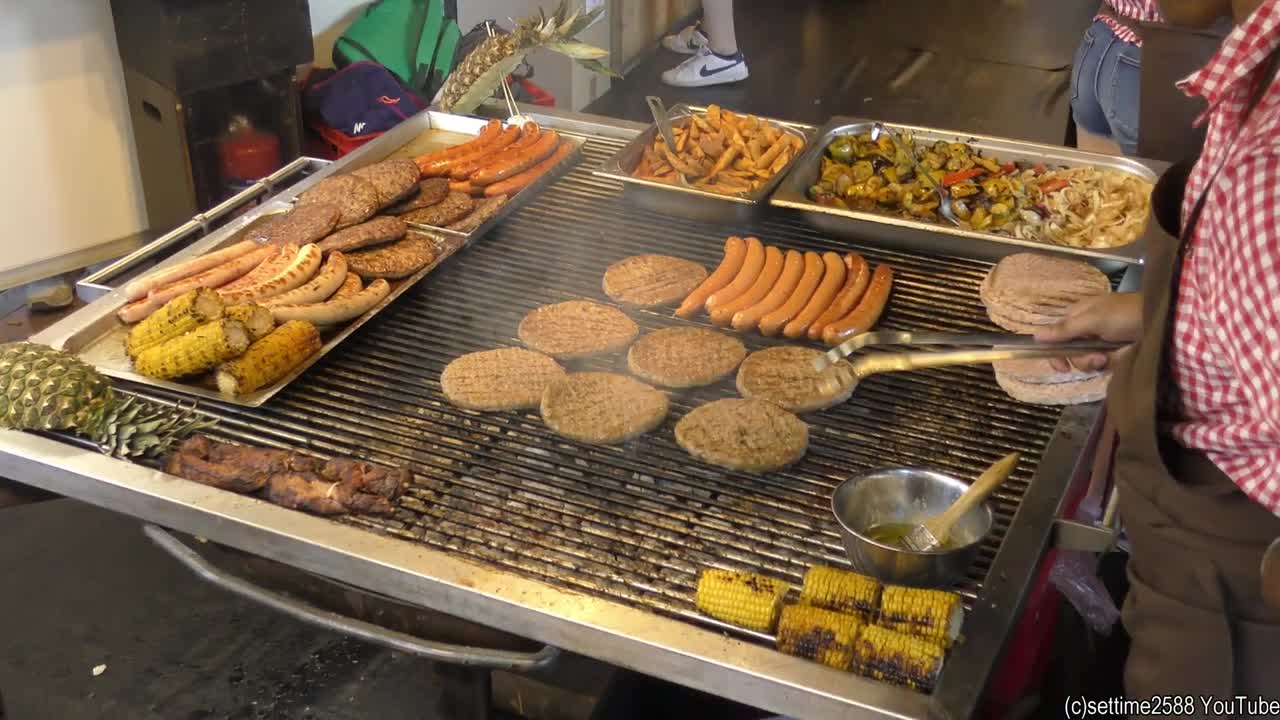 Italy Street Food. Grills with Large Burgers, Sausages, Asado and more Food